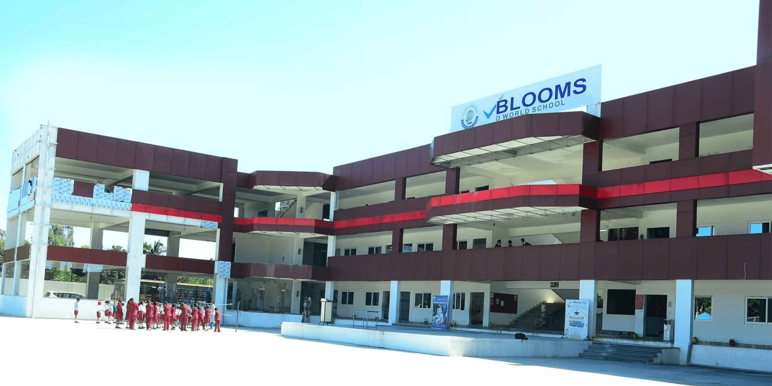 VBlooms campus exterior with landscaped grounds